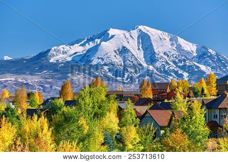 Residential neighborhood in Colorado at autumn, USA. Mount Sopris landscape.
