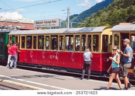 Wilderswil, Bernese Oberland, Switzerland - August 5, 2017 : Tourists On Platform Of The Wilderswil 