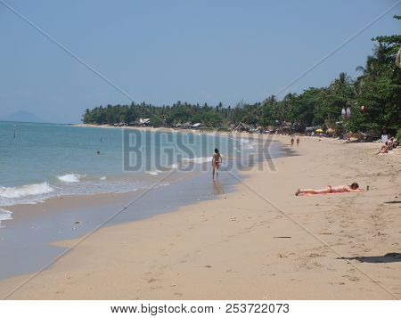 Relaxing On A Sundrenched Beach On Koh-lanta Island Thailand