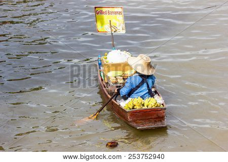 Damnoen Saduak Floating Market, Thailand Small Boats Laden With Colourful Fruits And Vegetables And 