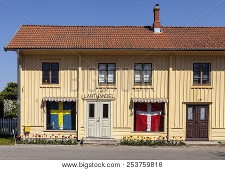 Kristianopel, Sweden On May 14. View Of A Front, Old Local Store, Danish And Swedish Flag On May 14,