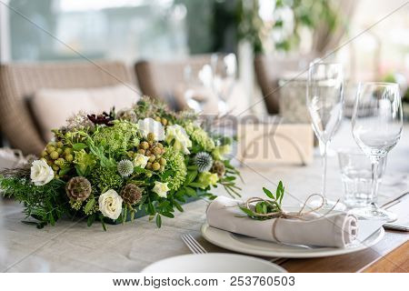 Wedding Banquet Or Gala Dinner. The Chairs And Table For Guests, Served With Cutlery And Crockery. C