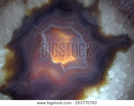A Natural Abstract Of A Purple And White Quartz Druzy In A Backlighted Geode Rock.