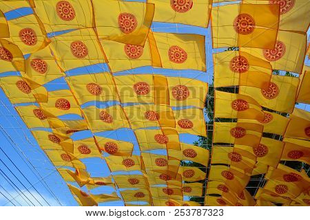Thammachak Flags At An Ancient Buddhist Temple In Chiang Mai, Thailand.