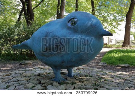 Sculpture Of A Blue Bird In The Park