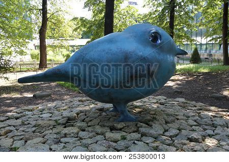 Sculpture Of A Blue Bird In The Park