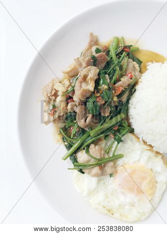 Stir Fried Water Spinach With Meal, Fried Egg In Thai Style With Rice In White Dish  On White Backgr
