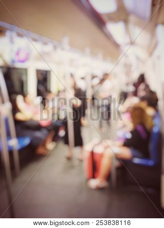 Blurred Abstract Background Image Of People Inside Mass Rapid Transit Go To Work By Electric Train E
