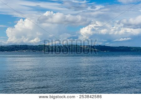 Billowing Clouds Hover Over Maury Island In Washington State.