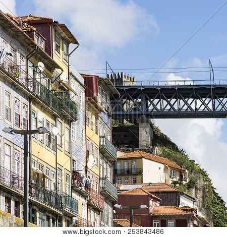 Bridge Built By Eiffel On The Bacground Of The Historical Centre Of The City Of Porto With Tradition