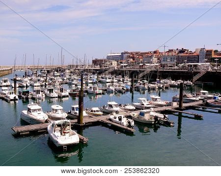 Fishing Boats In The Bay Of The City Of Gijón, Asturias. Spain. Europe