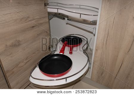 Solution For A Kitchen Corner Storage In A Cupboard. A Corner Unit With Pullout Shelves For Cookware