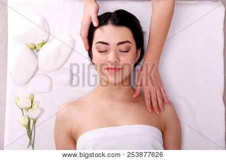 A Girl Is Wrapped In A White Towel.spa Concept