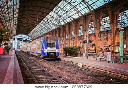 Nice, France - May 23, 2012: Passenger Local Train Arrives To The Patform.