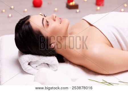A Pleasing Massage With Candles. Spa Concept