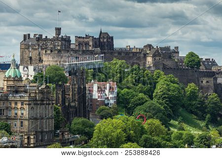 Edinburgh, Scotland, Uk - June 13, 2012: Looking From Calton Hill Upon Dark Brown Castle And Flagged
