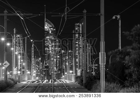 View Looking Through Gold Coasts Light Rail Tram System With Surfers Paradise Cityscape In The Backg