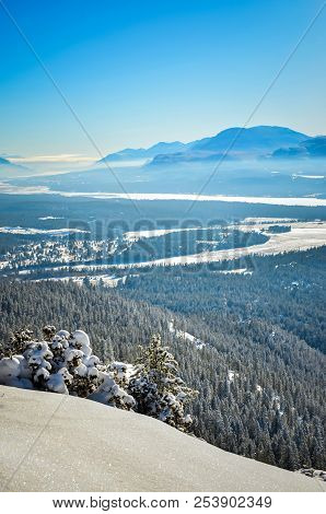 Fresh Snow On Swansea Mountain Near Invermere, British Columbia, With The Purcell Mountains To The R