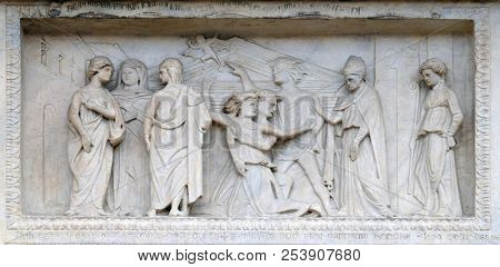MODENA, ITALY - JUNE 04: Panel with episodes of the life of St. Geminiano, by Agostino di Duccio of about 1442, Modena Cathedral, Italy on June 04, 2017.