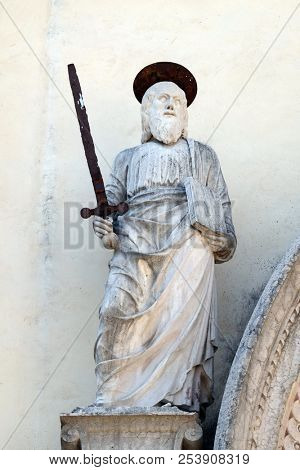 VERONA, ITALY - MAY 27: Saint Paul the Apostle, statue on the facade of Palazzo del Vescovado, Verona Diocesan Palace, Italy, on May 27, 2017.