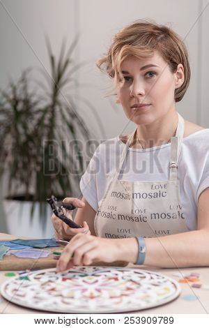 Workplace Of The Mosaic Master: Women's Hands Holding Tool For Mosaic Details In The Process Of Maki