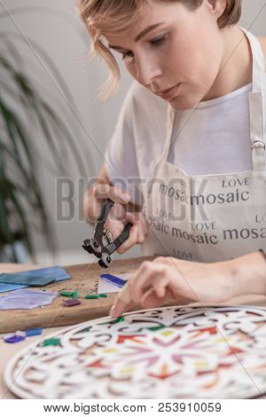 Workplace Of The Mosaic Master: Women's Hands Holding Tool For Mosaic Details In The Process Of Maki