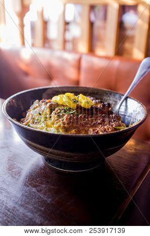 Japanese Crispy Pork Katsudon Rice Bowl With Takuan Daikon Radish Pickle Garnish