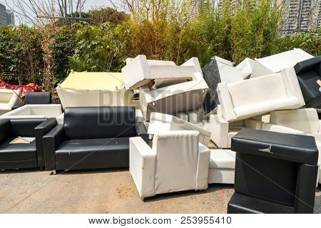 Big pile of old broken furniture