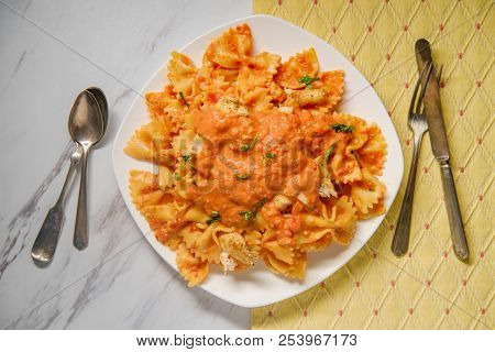 Farfalle Bow Tie Pasta In Creamy Vodka Tomato Sauce With Grilled Chicken And Green Peas