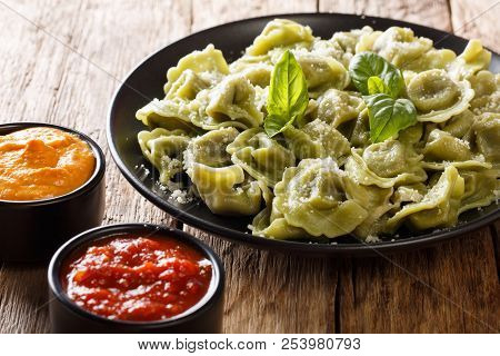 Tasty Spinach Green Cappelletti, Ravioli, Tortellini With Cheese, Basil, Ketchup, Mustard Close-up.