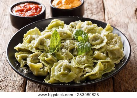 Delicious Spinach Green Cappelletti, Ravioli, Tortellini With Parmesan Cheese, Basil, Sauces Close-u