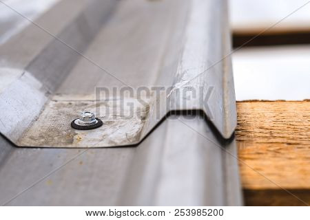 Gray Corrugated Metal Cladding On Industrial Building Roof