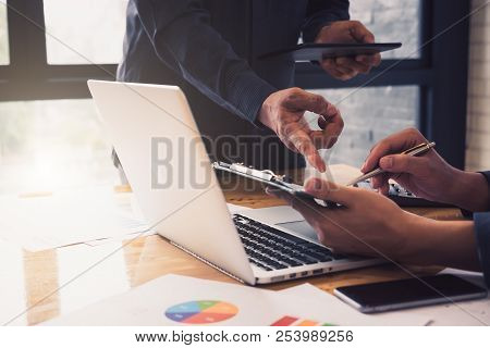 Close Up Asian Business Woman Using A Calculator To Calculate The Numbers.business Finances And Acco