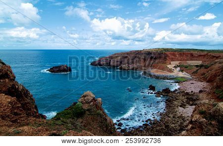 View On Praia Do Portinho Do Forno With Horizon Under Blue Sky Outdoors. Aljezur, Lagos Region, Port