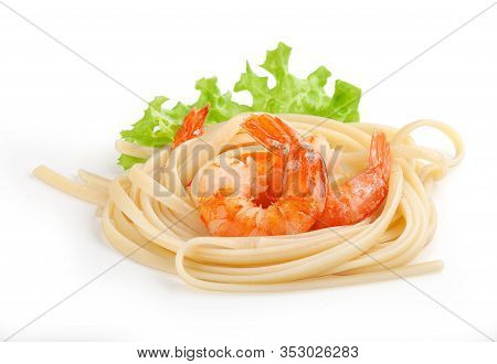Handful Of Fried Shrimps With Pasta And Fresh Lettuce
