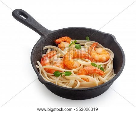 Fried Shrimps With Prepared Pasta In The Iron Pan