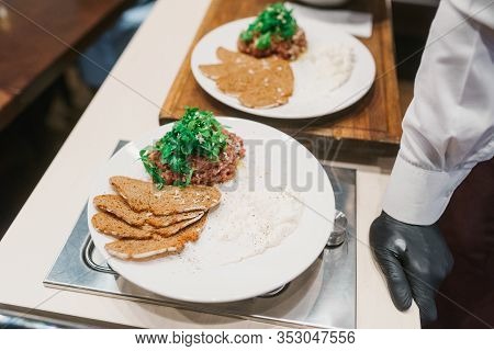 Slices Of Bread, Stack Of Fried Meat With Arugula Leaves And Tartar Sauce