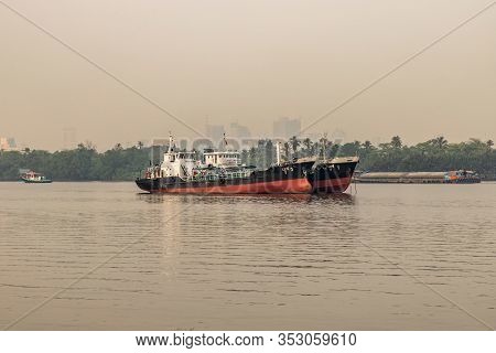 Bangkok,thailand - Feb 27, 2020 : View Of Chao Phraya River Has Cargo Ships Docked In The Middle Riv