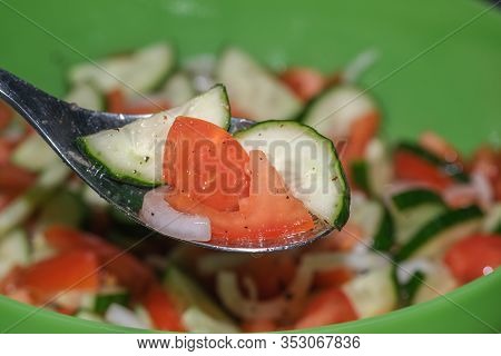 Cucumber Salad With Tomatoes. Close-up. Selective Focus.
