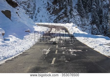 A Road Passing Through Snow Covered Mountains Of Himalayas At Drass. Srinagar-leh Highway. Beacon. B
