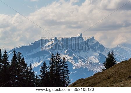 Snowcapped Schrattenfluh With Hengst Mountains In Swiss Alps, Cloudy Sky