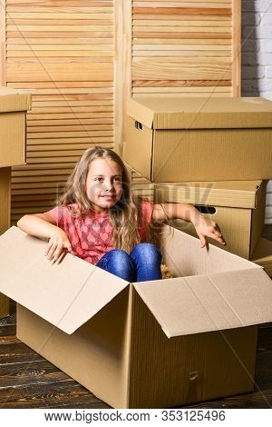 Big Storage Space. Relocating Family Stressful For Kids. Kid Girl Relocating Boxes Background. Reloc
