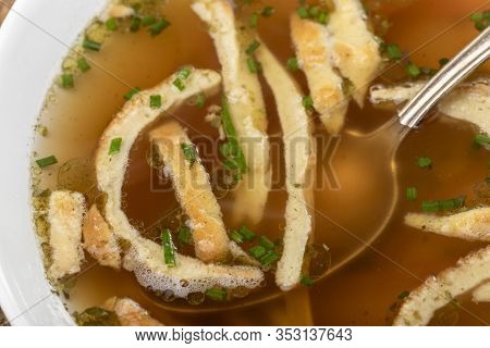 Overview Of A Bavarian Pancake Soup With Spoon