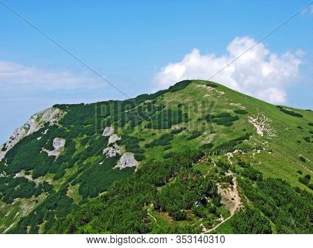 Grassy Alpine Mountain Peak Schönberg (schonberg Or Schoenberg) Over The Saminatal Alpine Valley And