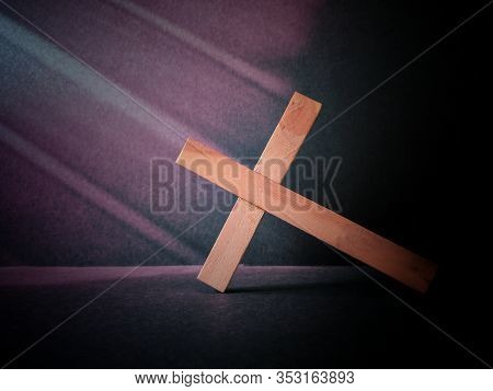 Lent Season,holy Week And Good Friday Concepts - Image Of Wooden Cross Leaning On Floor In Vintage B