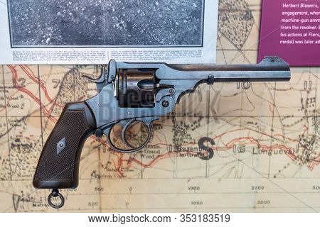 Bovington.dorset.united Kingdom.february 9th 2020.an Antique Service Revolver Is On Display At The T
