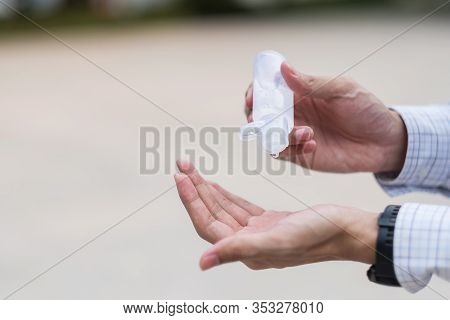 Man Hands Using Wash Hand Sanitizer Gel Dispenser, Against Novel Coronavirus Or Corona Virus Disease