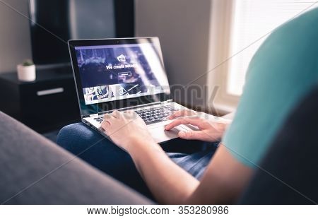 Testing New Responsive Website Design. Freelance Graphic And Web Designer Working From Home. Ui And 