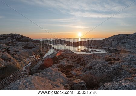 Sunset View Over North Port Marstrand And Cliffs In Foreground