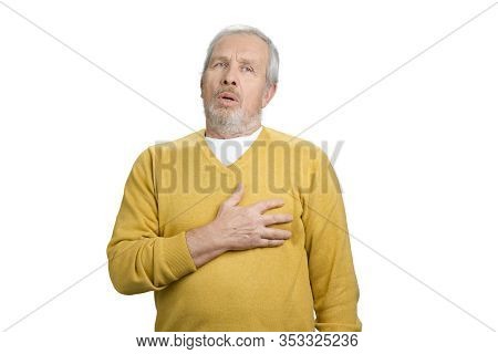 Heart Stroke Relief. Reducing Heart Pain. Portrait Of Old Man Touching Breast, White Isolated Backgr